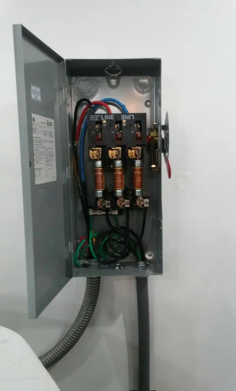 Three-phase disconnect switch installed for Smoke Detector Installation in Arlington